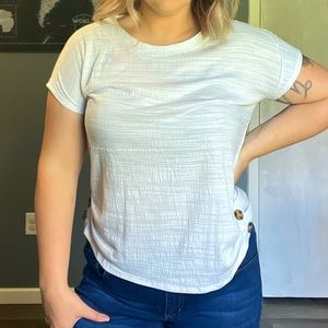 Plain white top with button detail